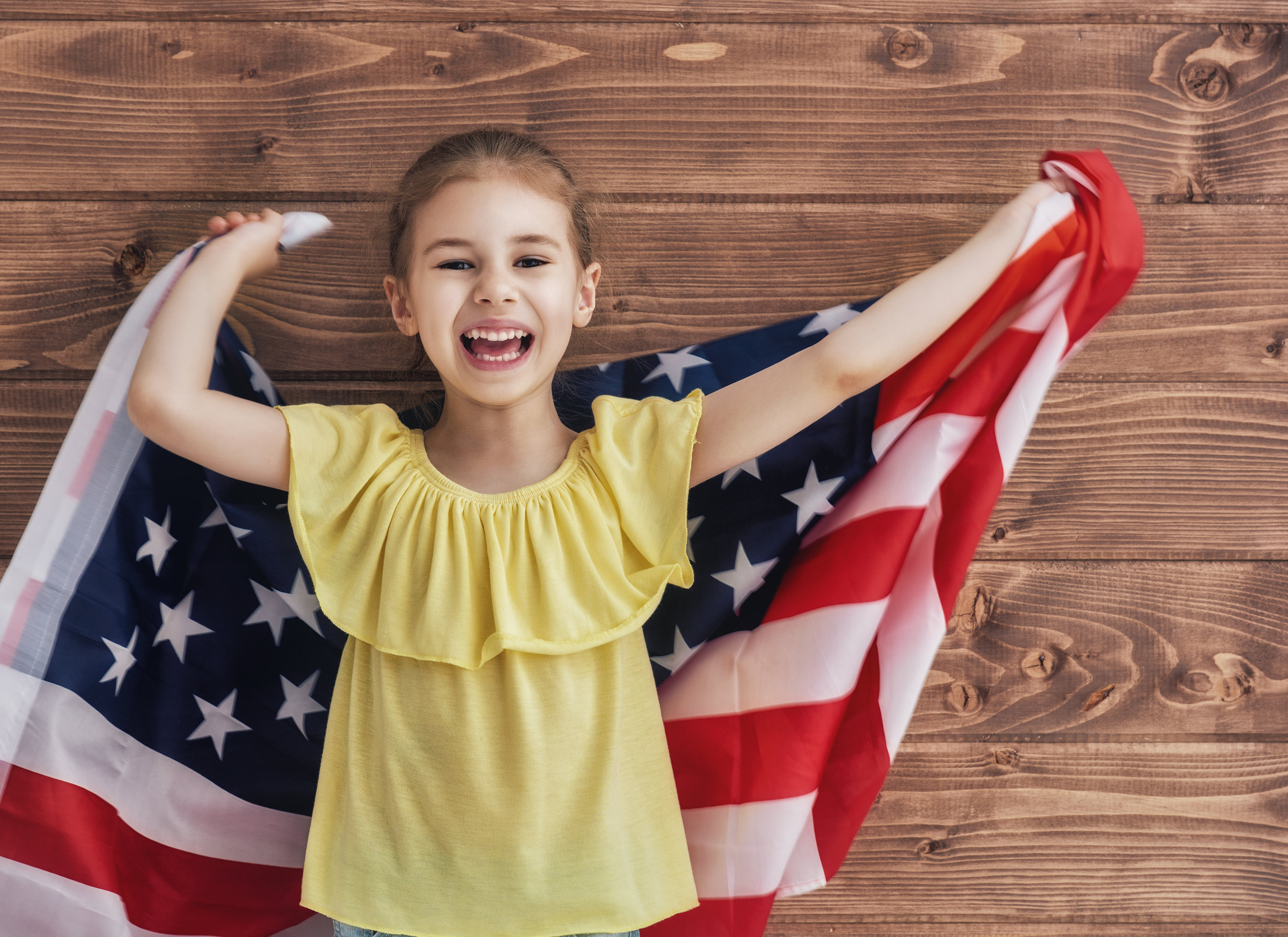 A picture of girl with national flag